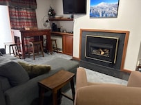 Cozy sitting area with gas fireplace. Perfect spot to read and relax.