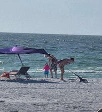 Able to watch the kids on the beach from the back patio