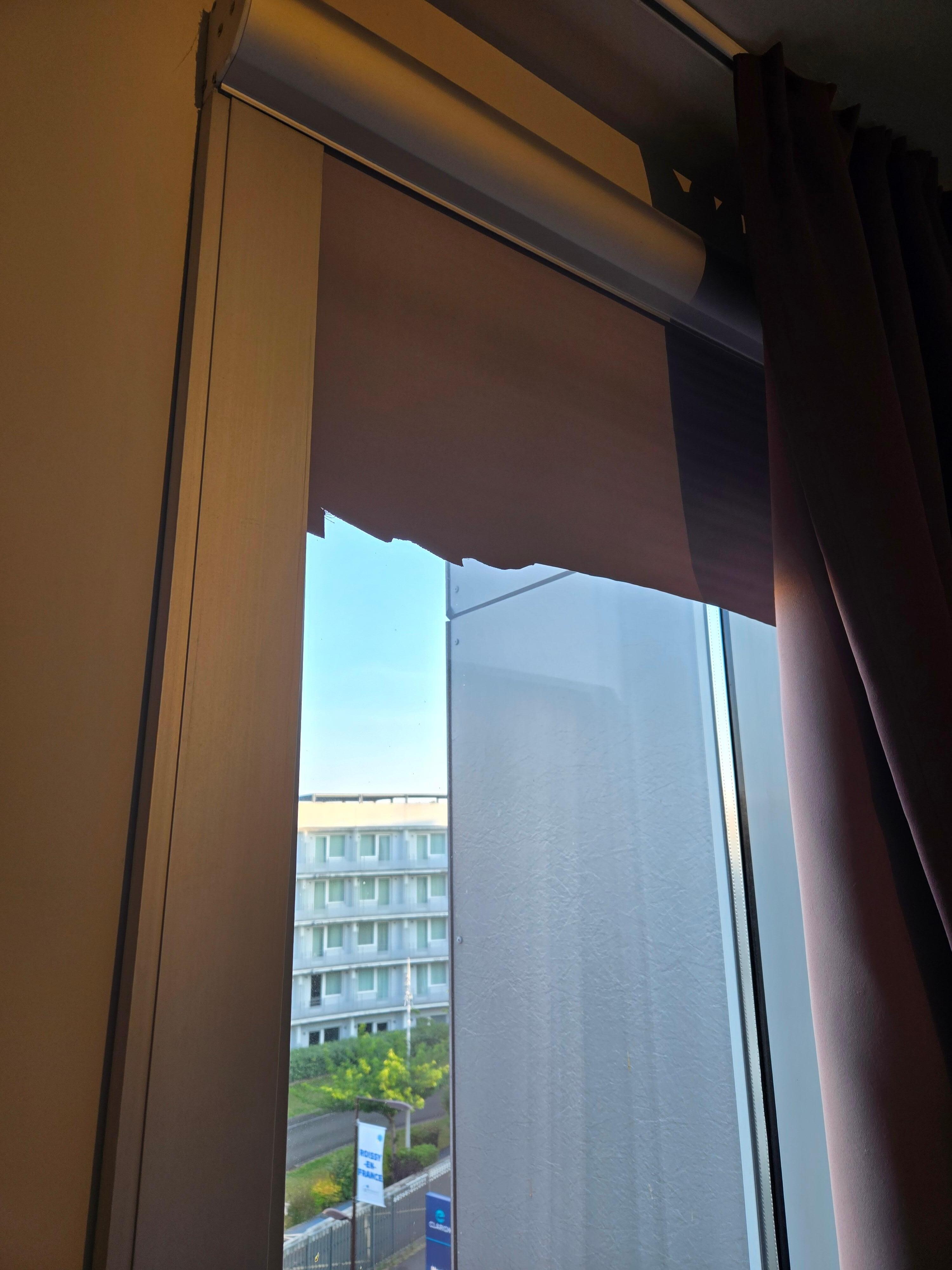 torn black out blind. 