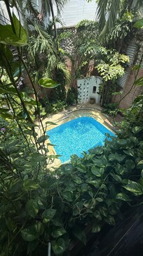 View of the pool from second floor during the day