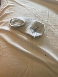Sock found under the covers