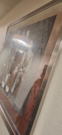 Dust on picture in hotel hallway - no construction in area