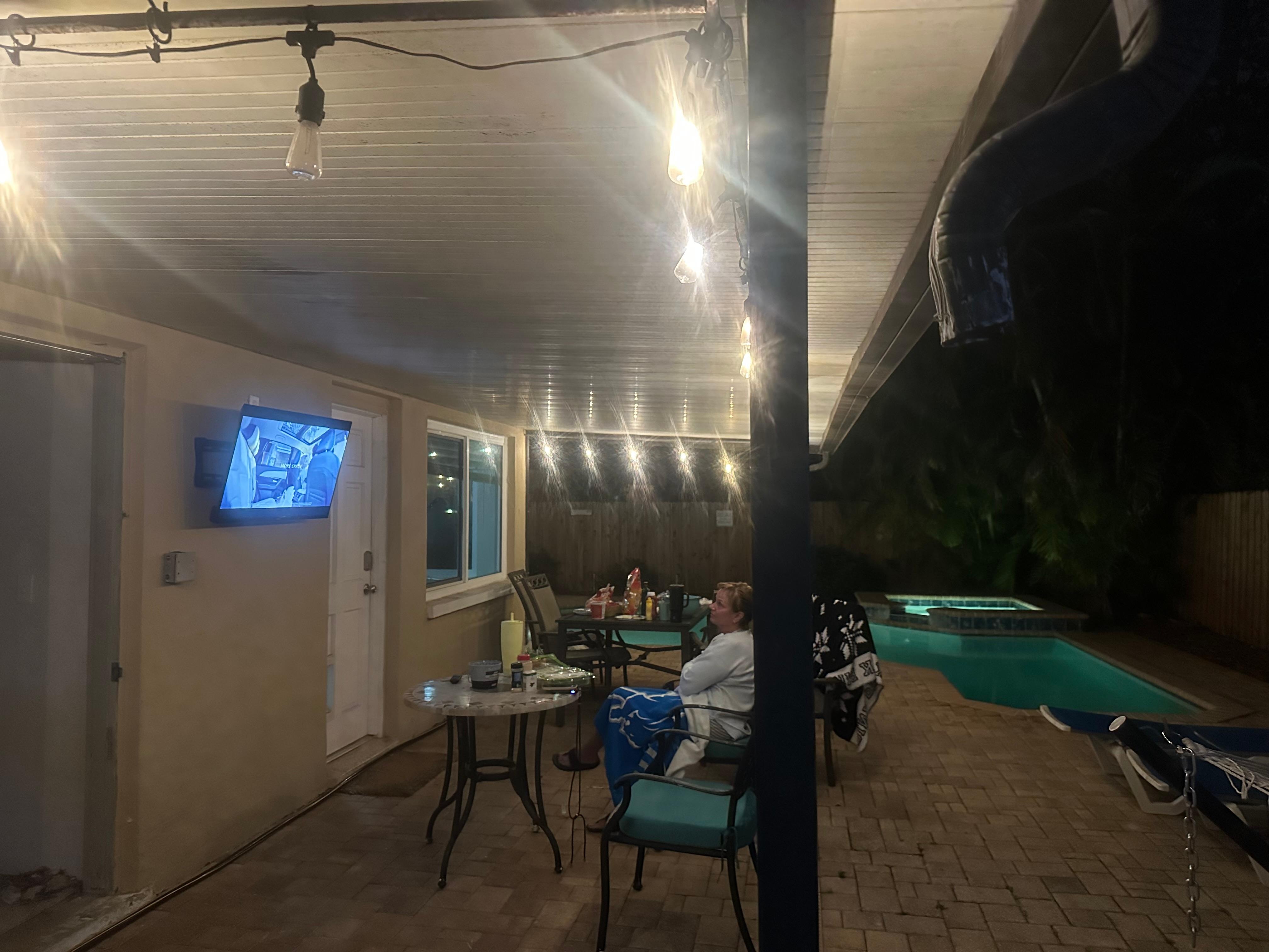 Michigan v UConn game on the outdoor TV
