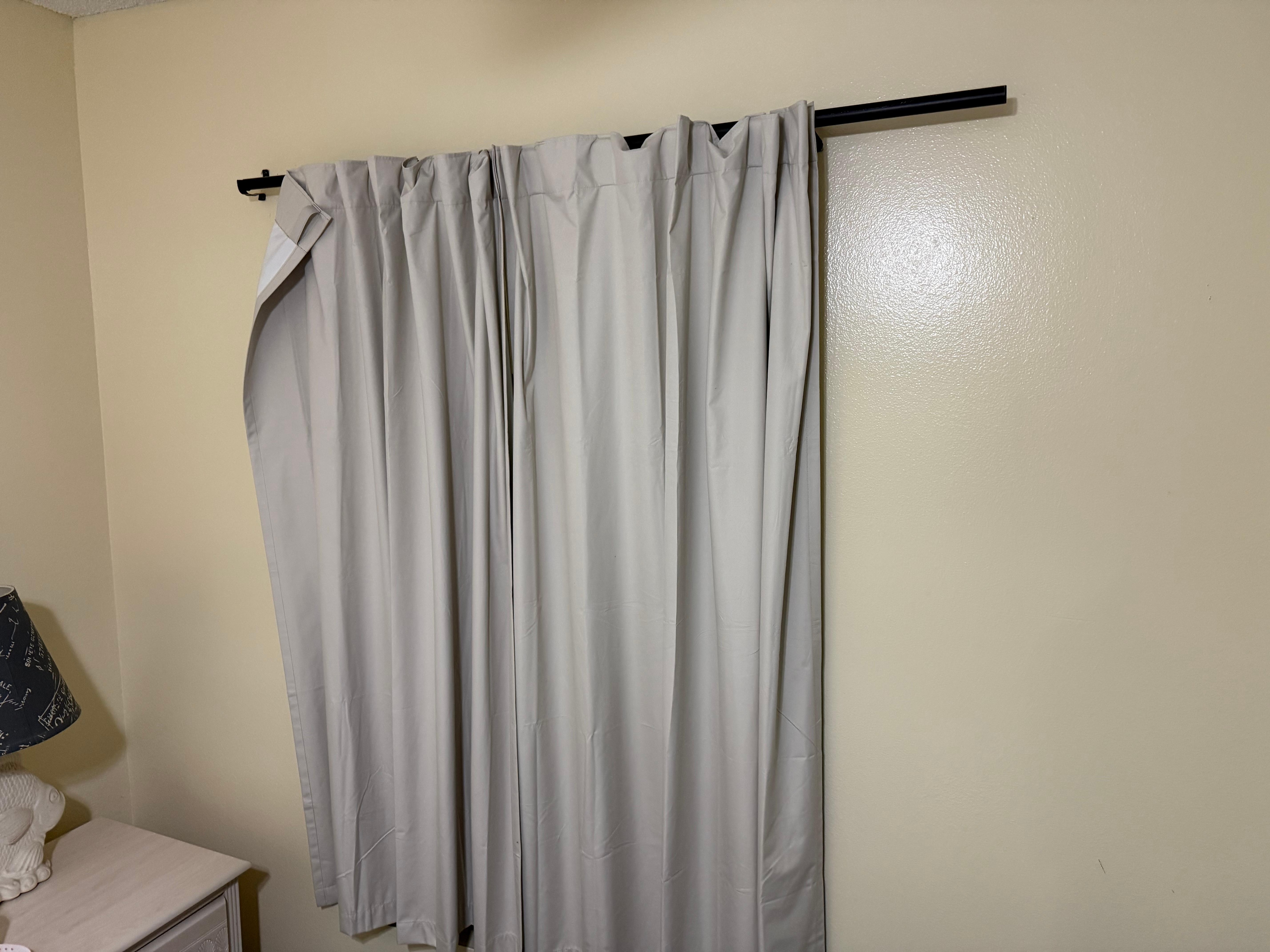 Curtains not even put on the rod