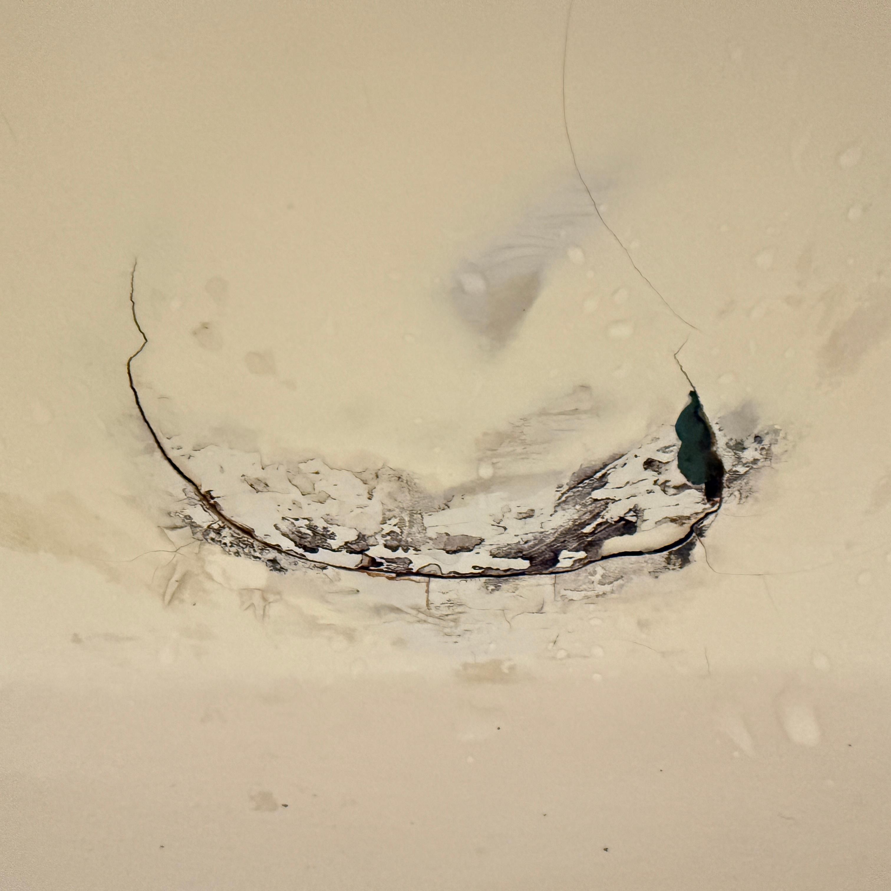 Hole in side of tub. 