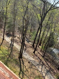 Looking down on walkway to boat ramp and lake from balcony