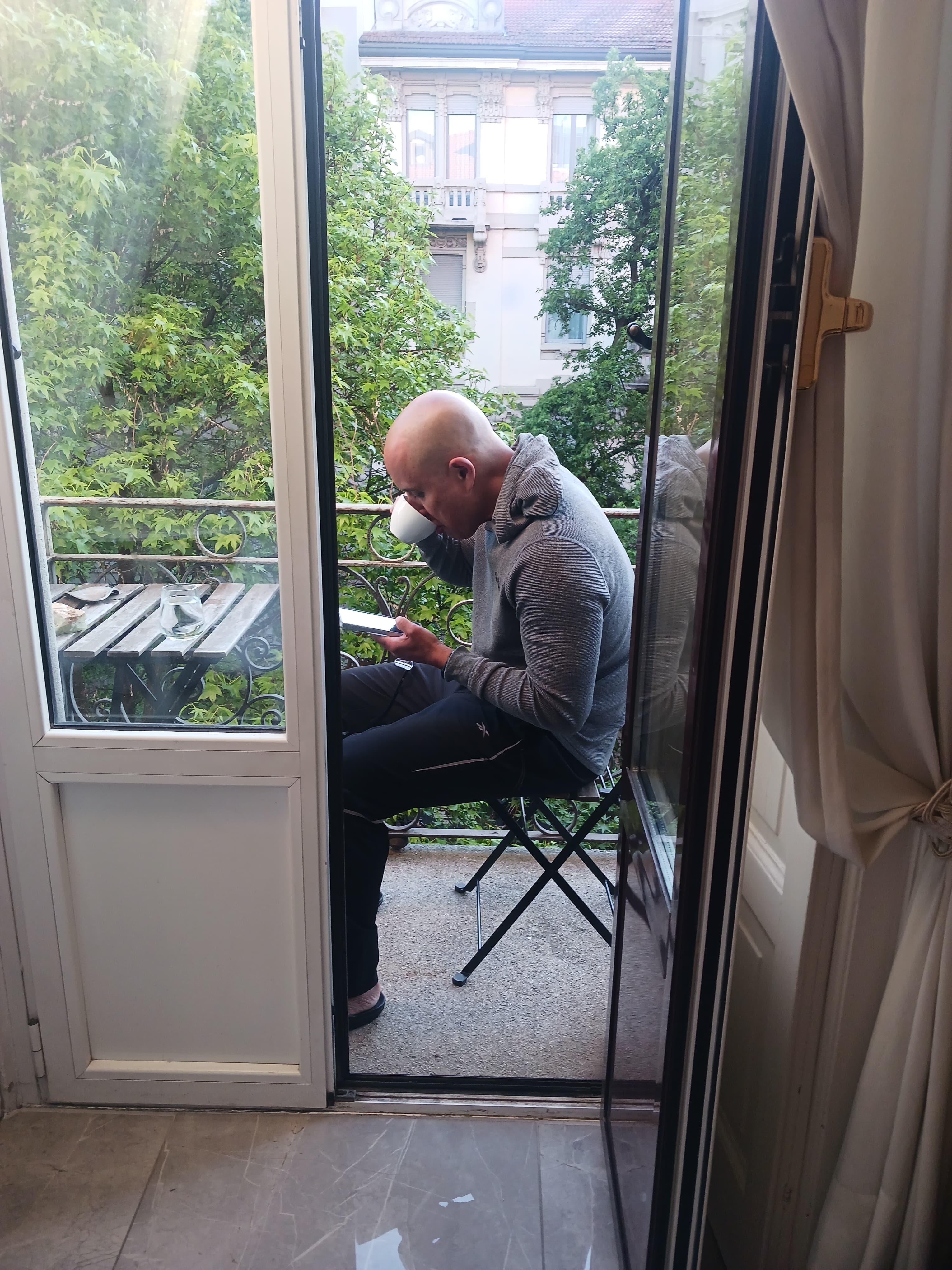 Enjoying the complimentary coffee on the balcony planning my day.