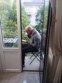 Enjoying the complimentary coffee on the balcony planning my day.