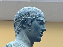 The charioteer in the museum. A masterpiece