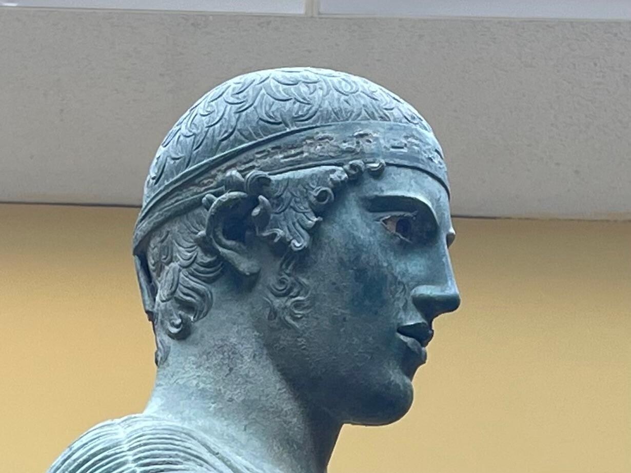The charioteer in the museum. A masterpiece 