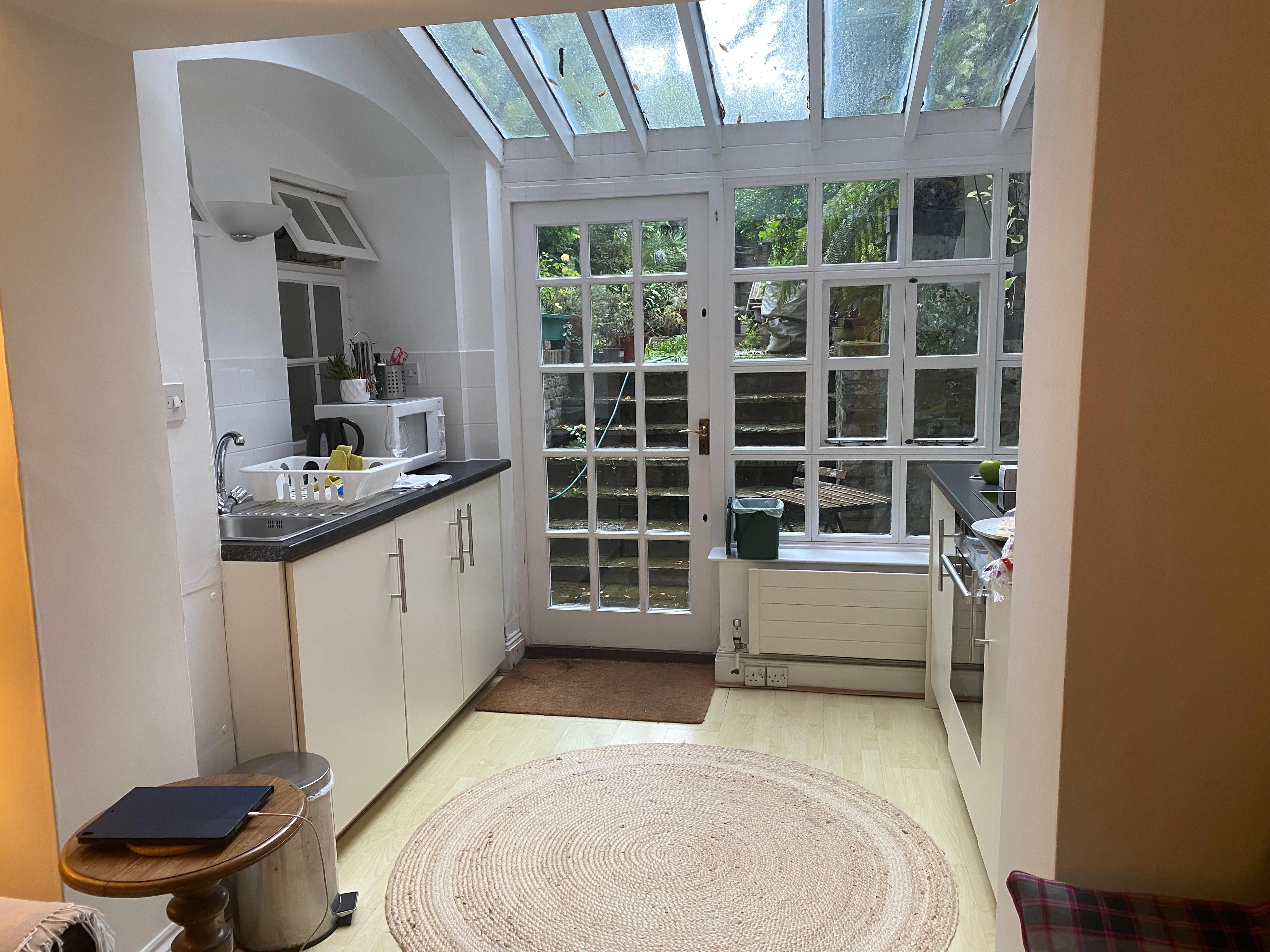 Bright kitchen with garden outside