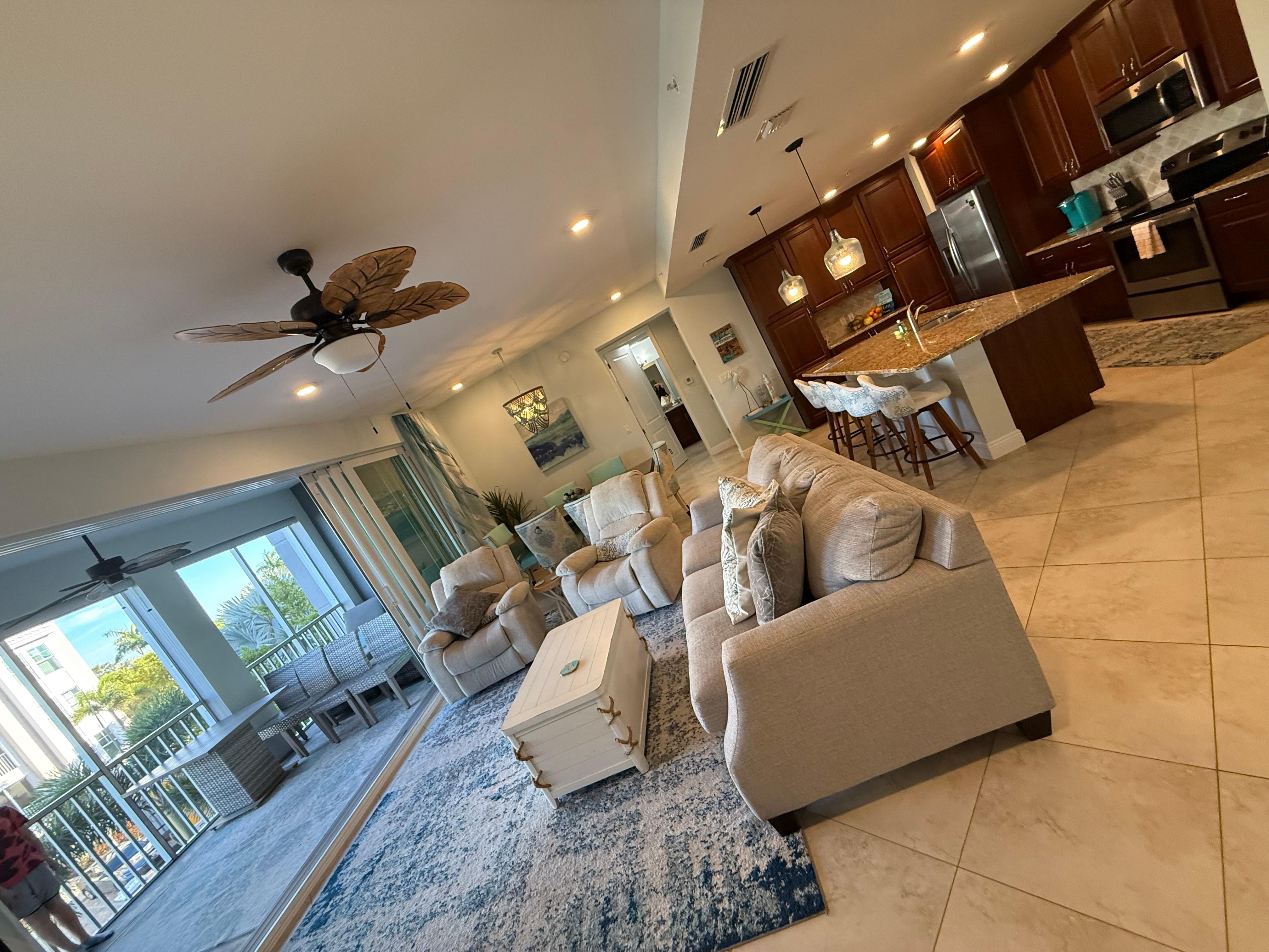 Love the full opening doors leading out to the lanai,  made the room feel huge