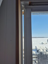 Gap in patio doors where cold air can come in.