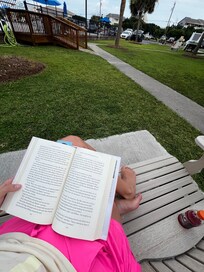 A cozy rocking bench in the community area right outside of the condo to enjoy.