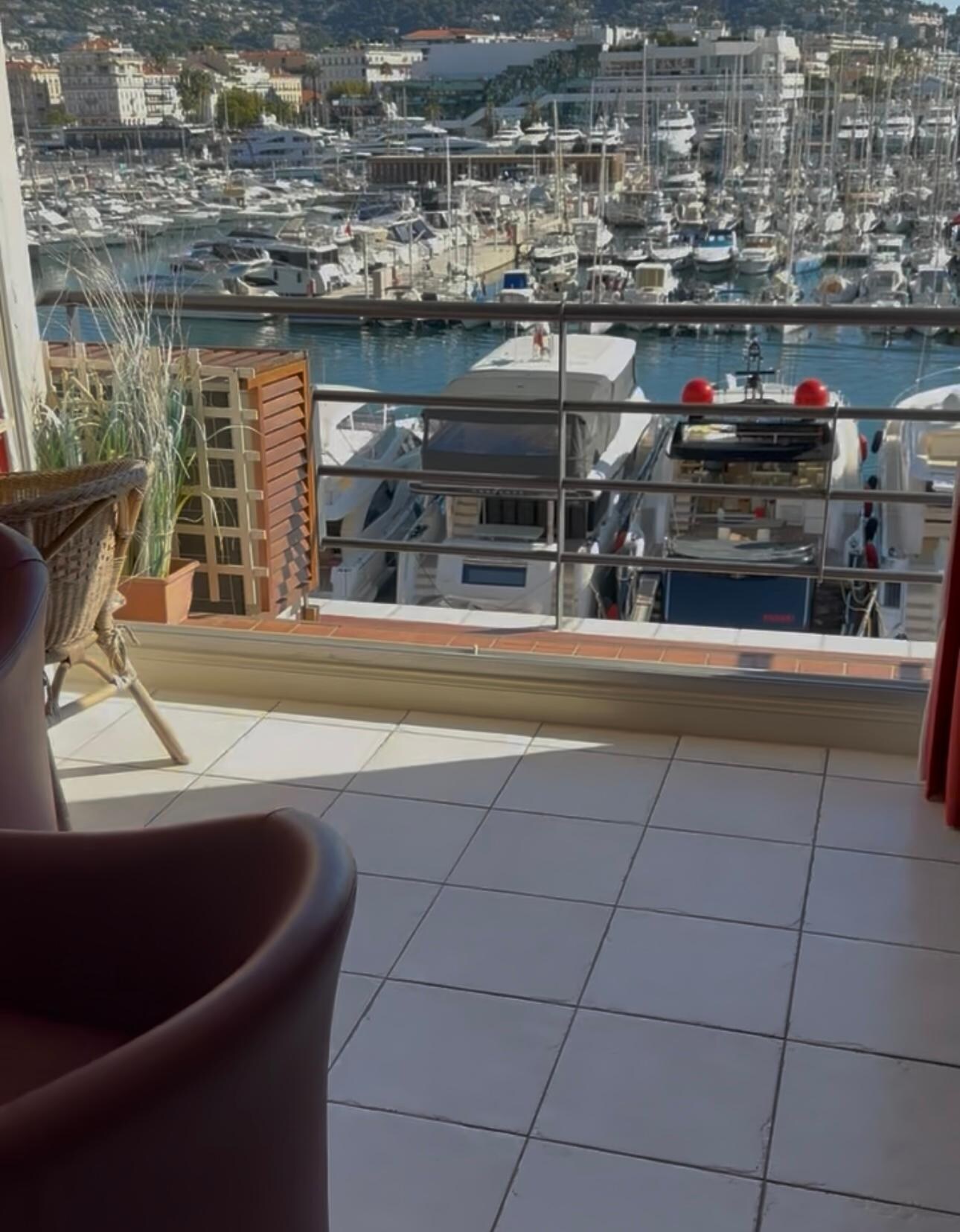 Sliding floor-to-ceiling doors open to a beautiful view