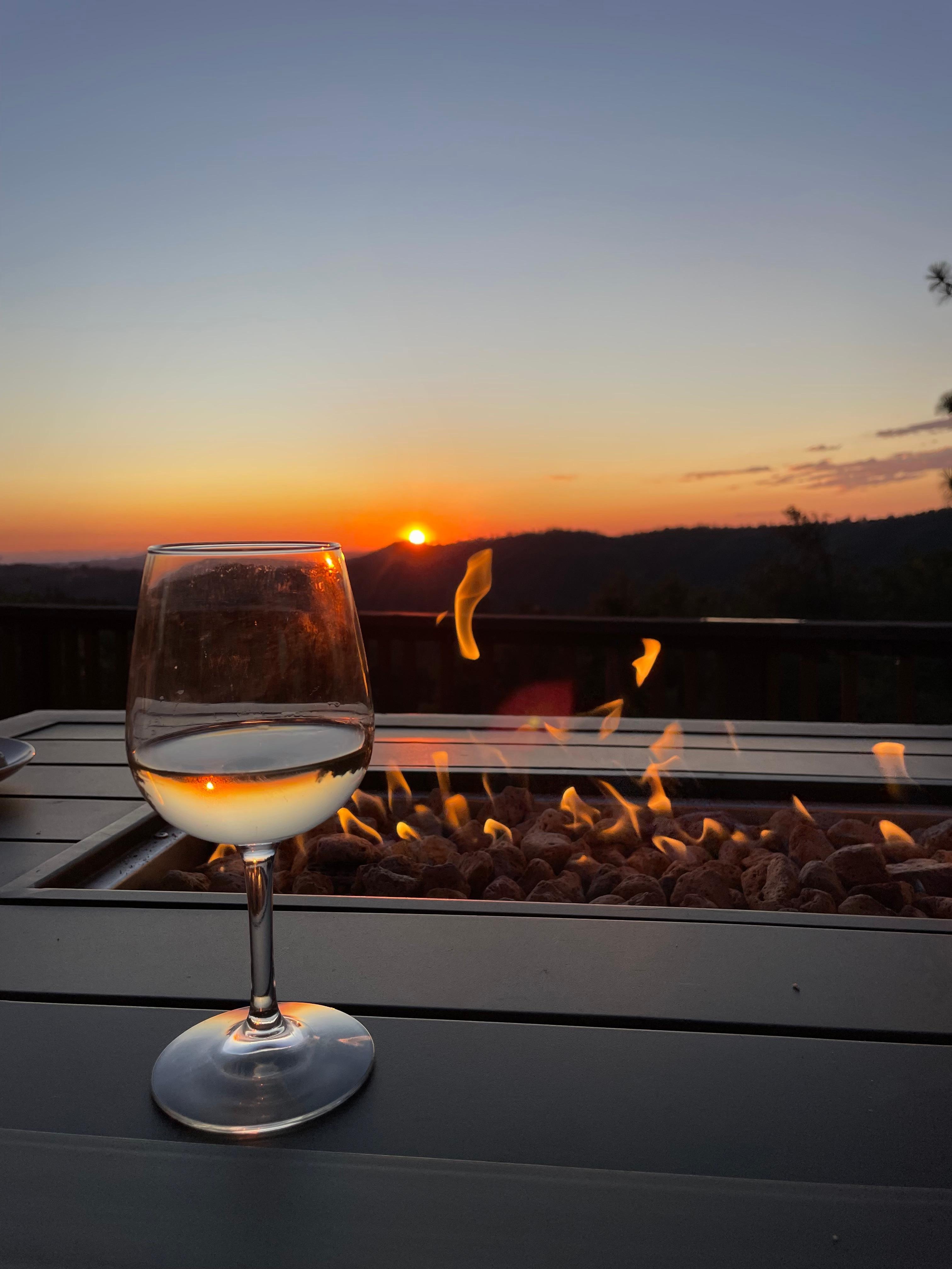 Sitting on the back deck enjoying a glass of wine. 7/5/2025