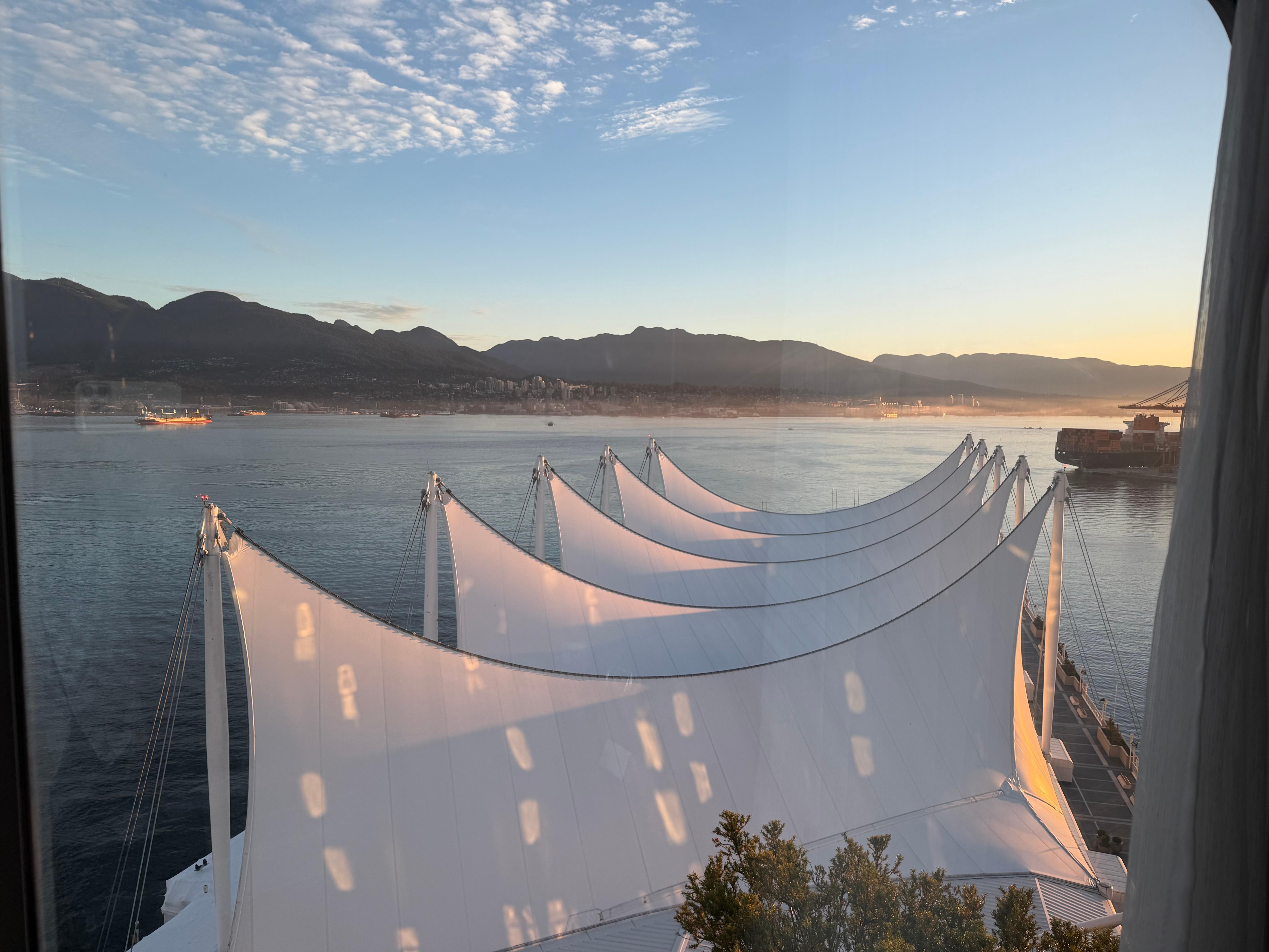 Iconic sails over the convention centre with North Vancouver across Burrard Inlet