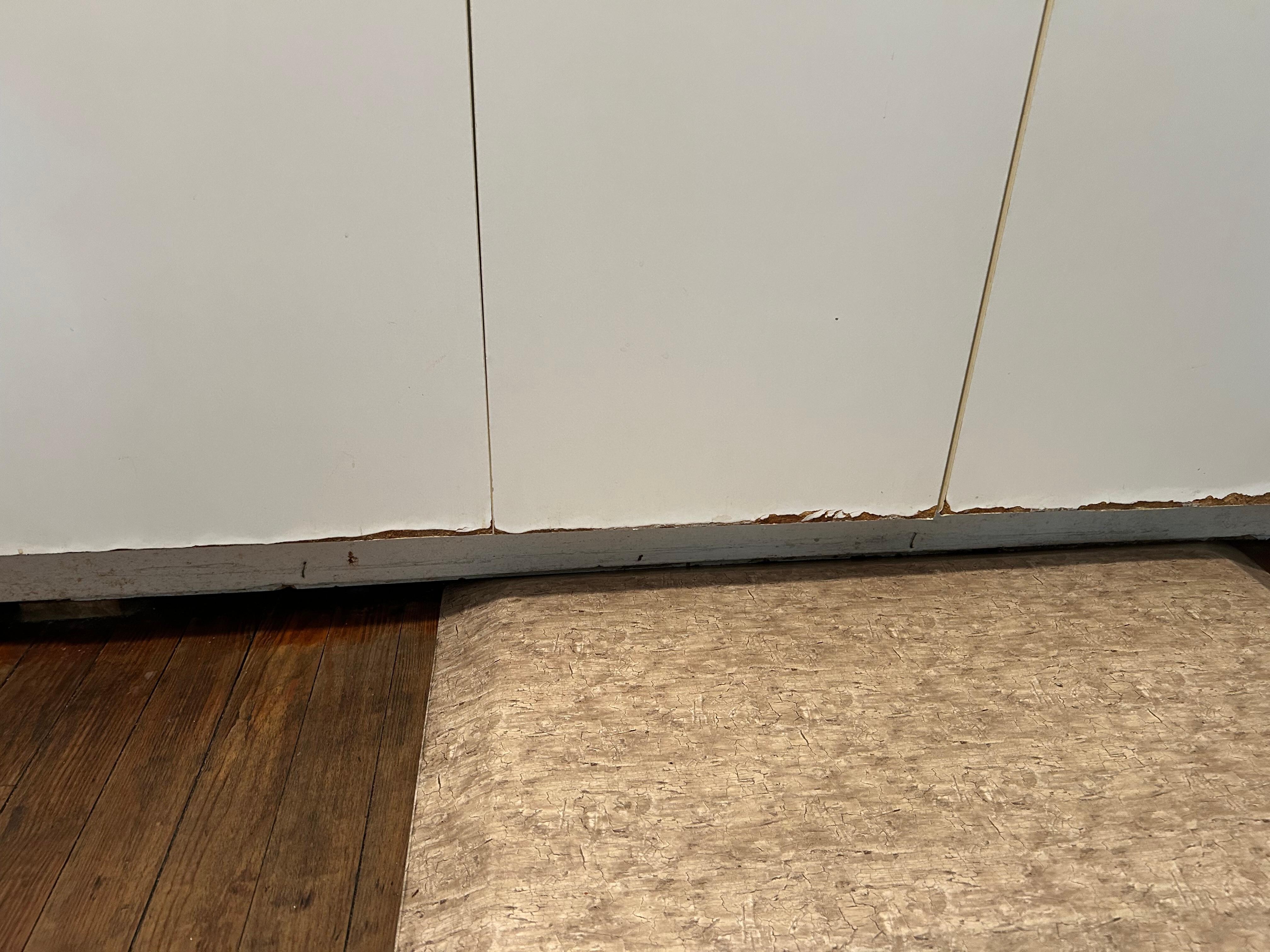 Cabinet is in bad repair.