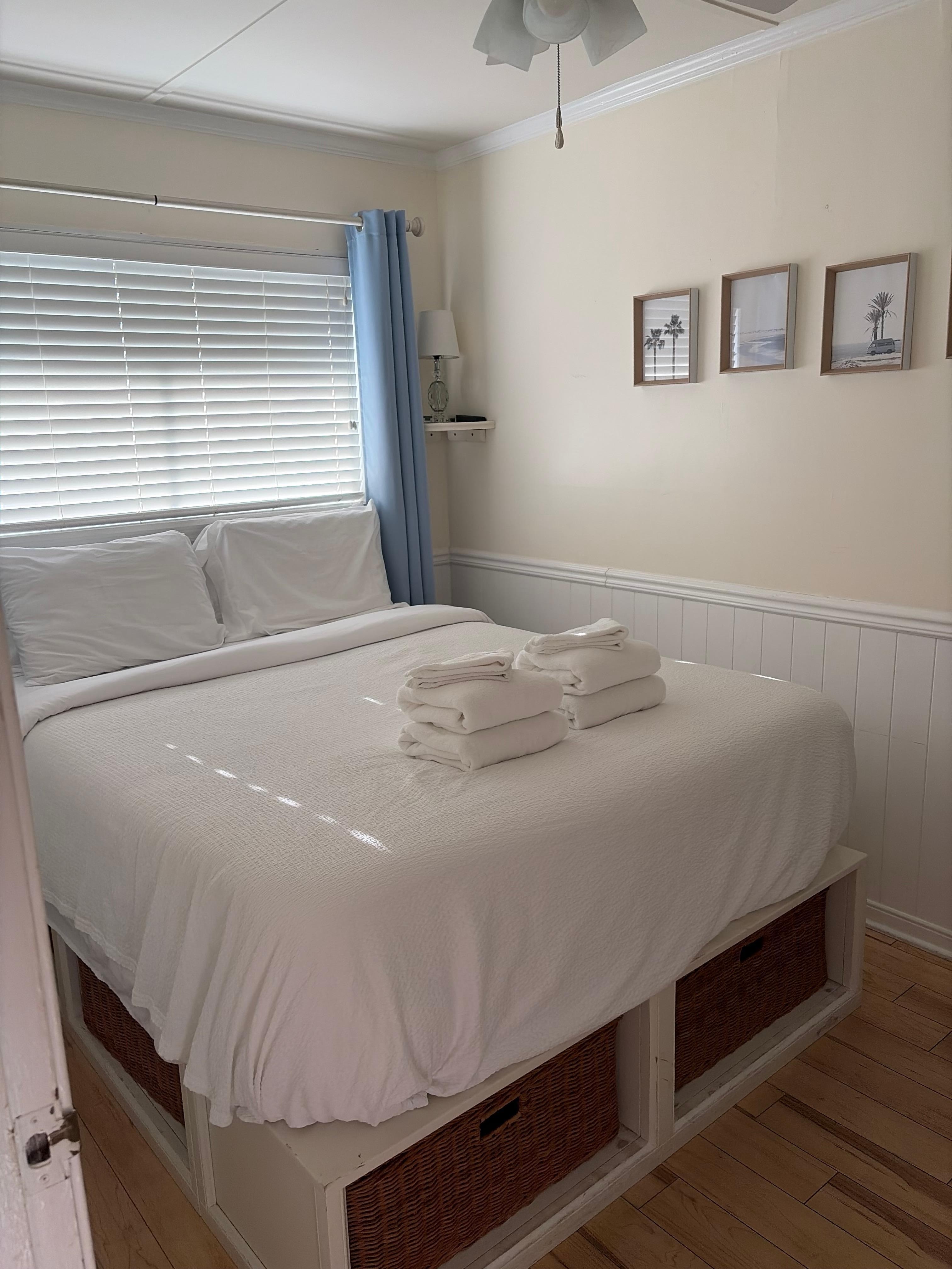 Bedroom - exterior light shines in at night by your head.   No side tables. 