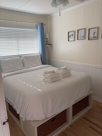 Bedroom - exterior light shines in at night by your head. No side tables.