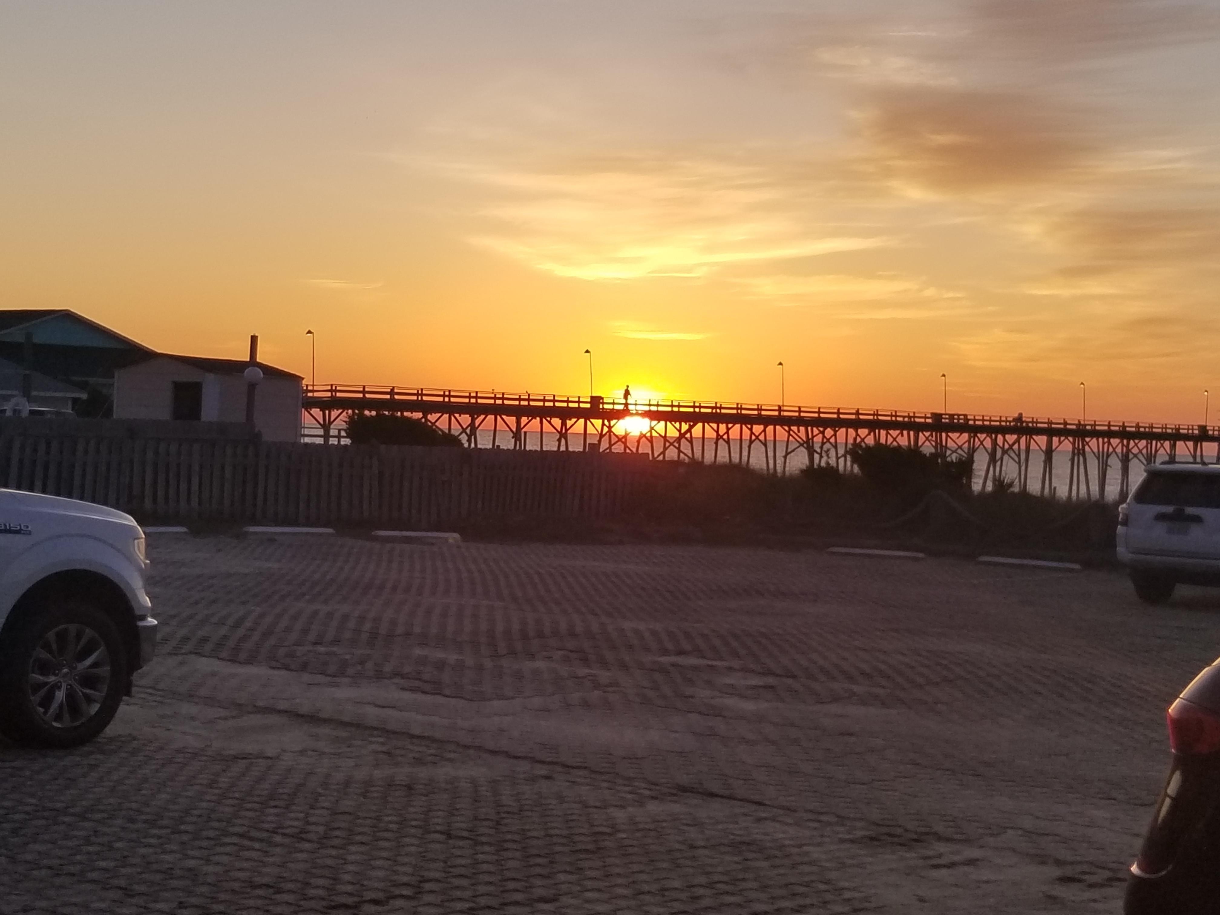 Sunrise over the pier, taken from my balcony