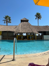Hotel pool, swim up bar/restaurant