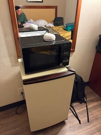 Smoke alarm on top of microwave.