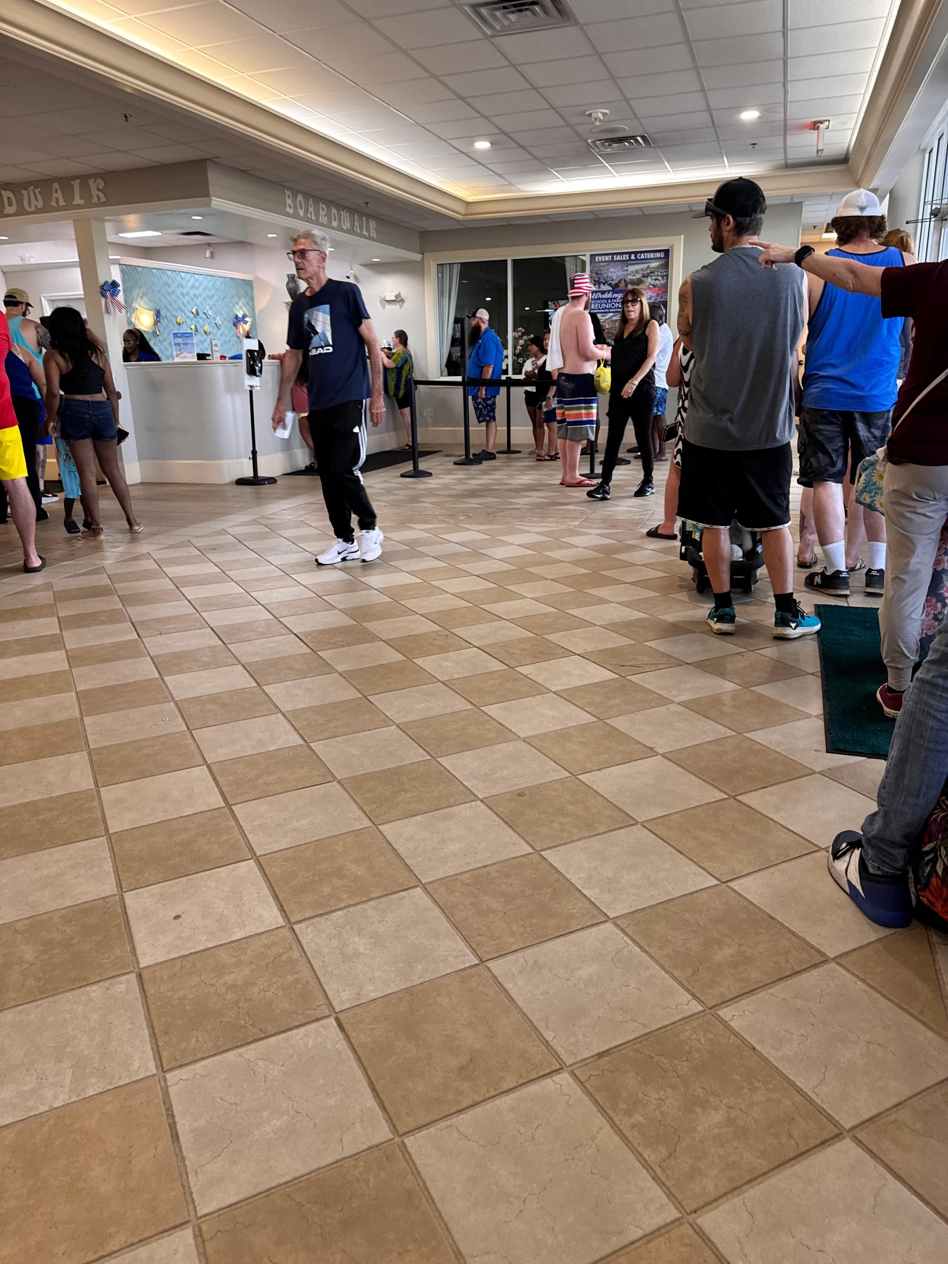 2 lines at check in. The longer line was to check in and get temp parking pass, the second line was for actual check in .. if you were called or texted when your room was ready.  Website doesn’t reflect check in time being 6pm. 
