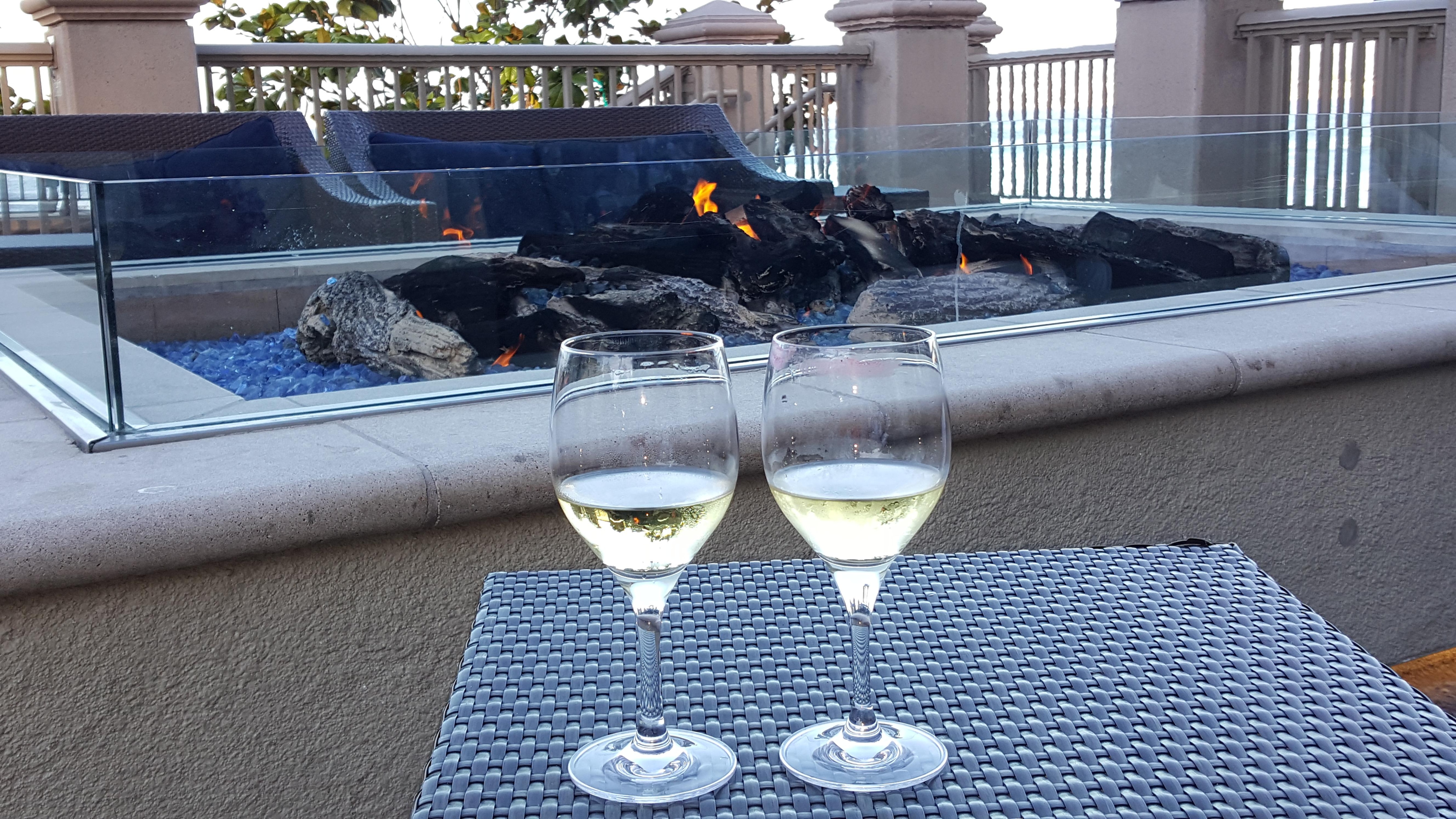 Wine and fire on patio