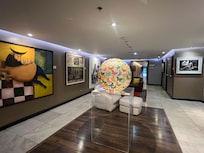 2nd floor elevator door opens to this amazing butterfly orb and gallery.