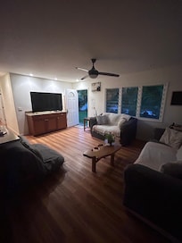 living room - dark sagging furniture, no glass top table