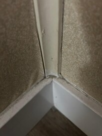 Bedroom corner baseboard