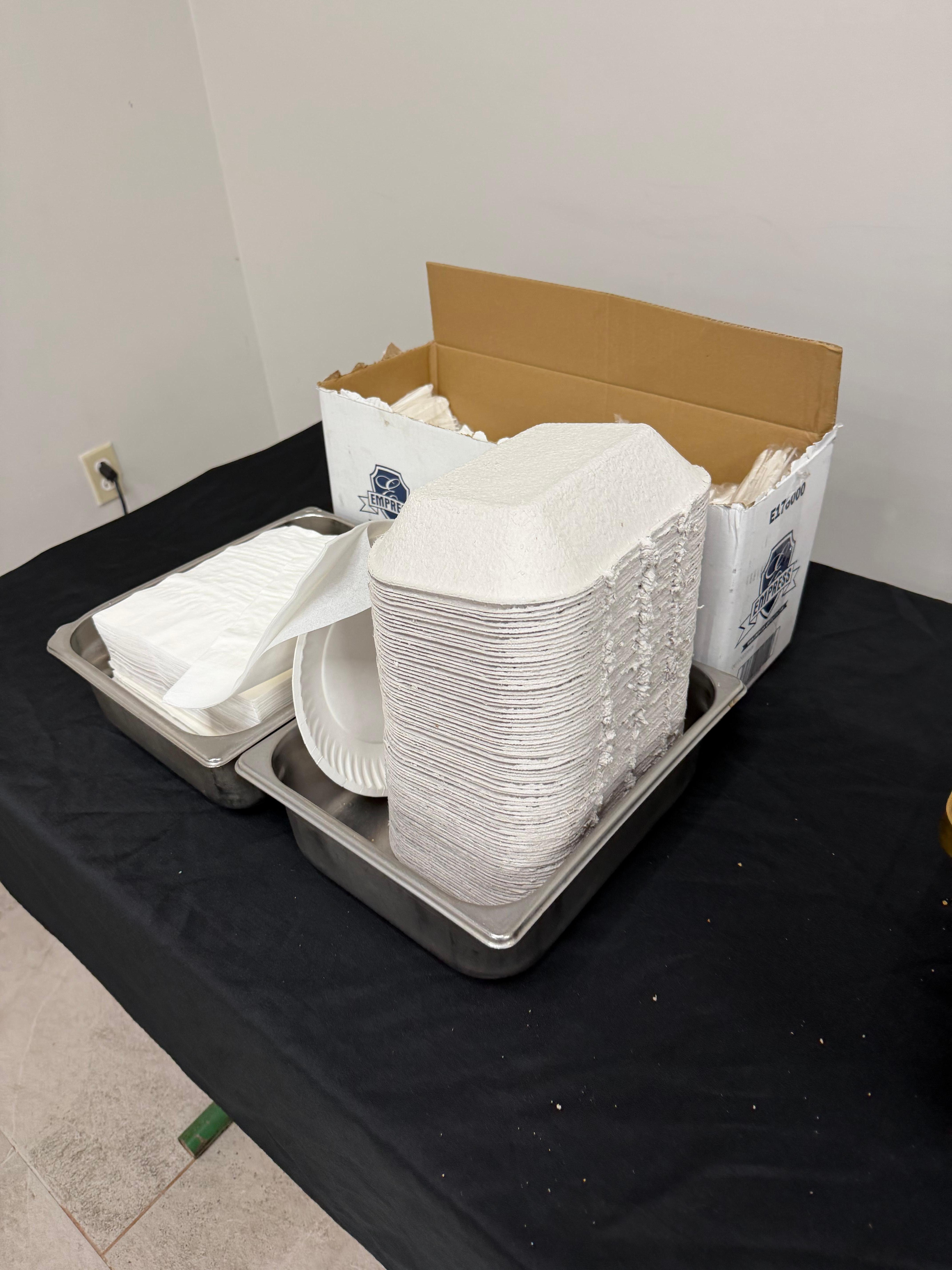 They ran out of actual plates so they gave to go containers that were cut in half. 