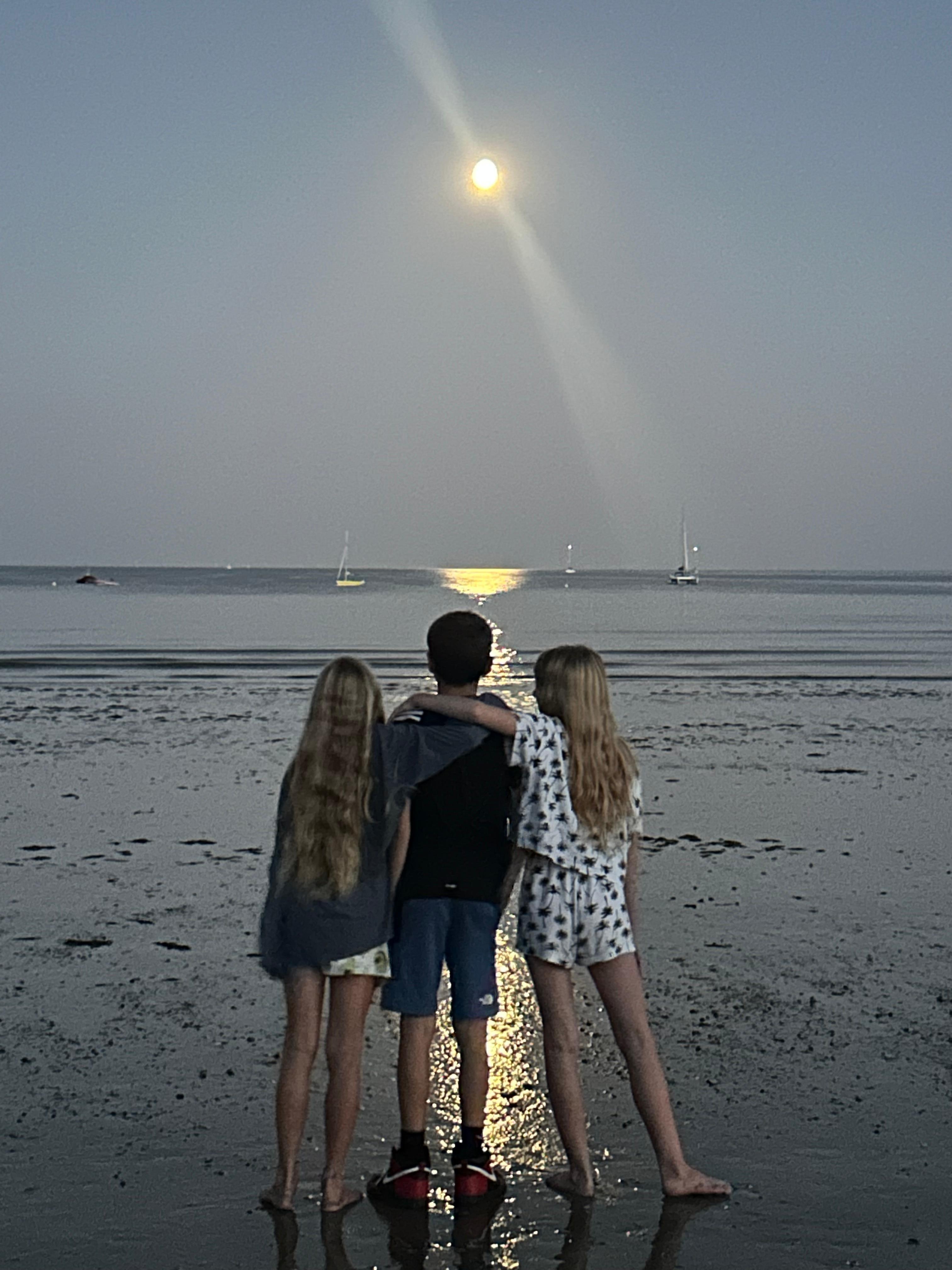 Kids enjoying the sunset.