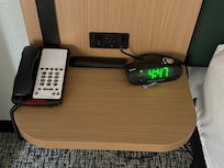 Side table in the first room. Room felt used.