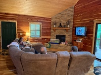 My family relaxing and watching tv together.