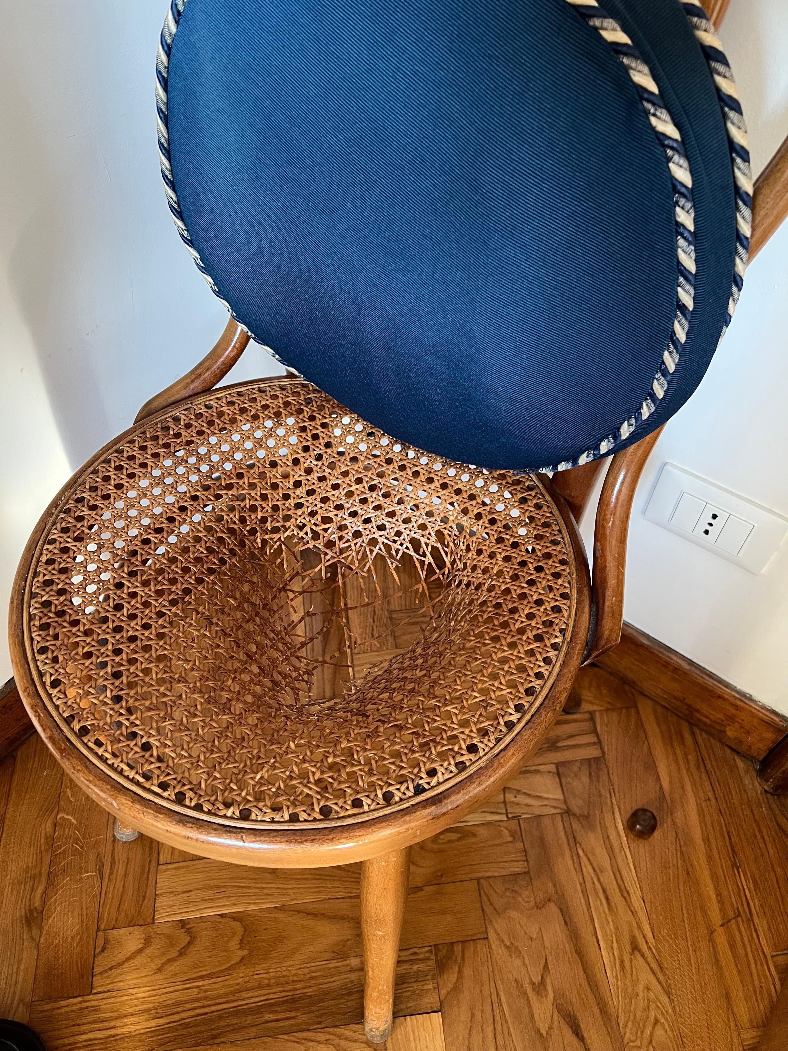 Broken chair at the dining table.