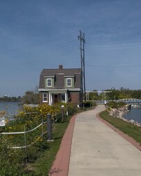 Small house associated with river lock system. Historical