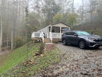 Had to walk down the driveway to get a picture of this sweet cabin