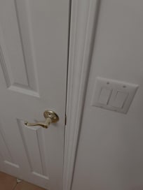General dirt/shoe prints/hand prints on walls and door frames.
