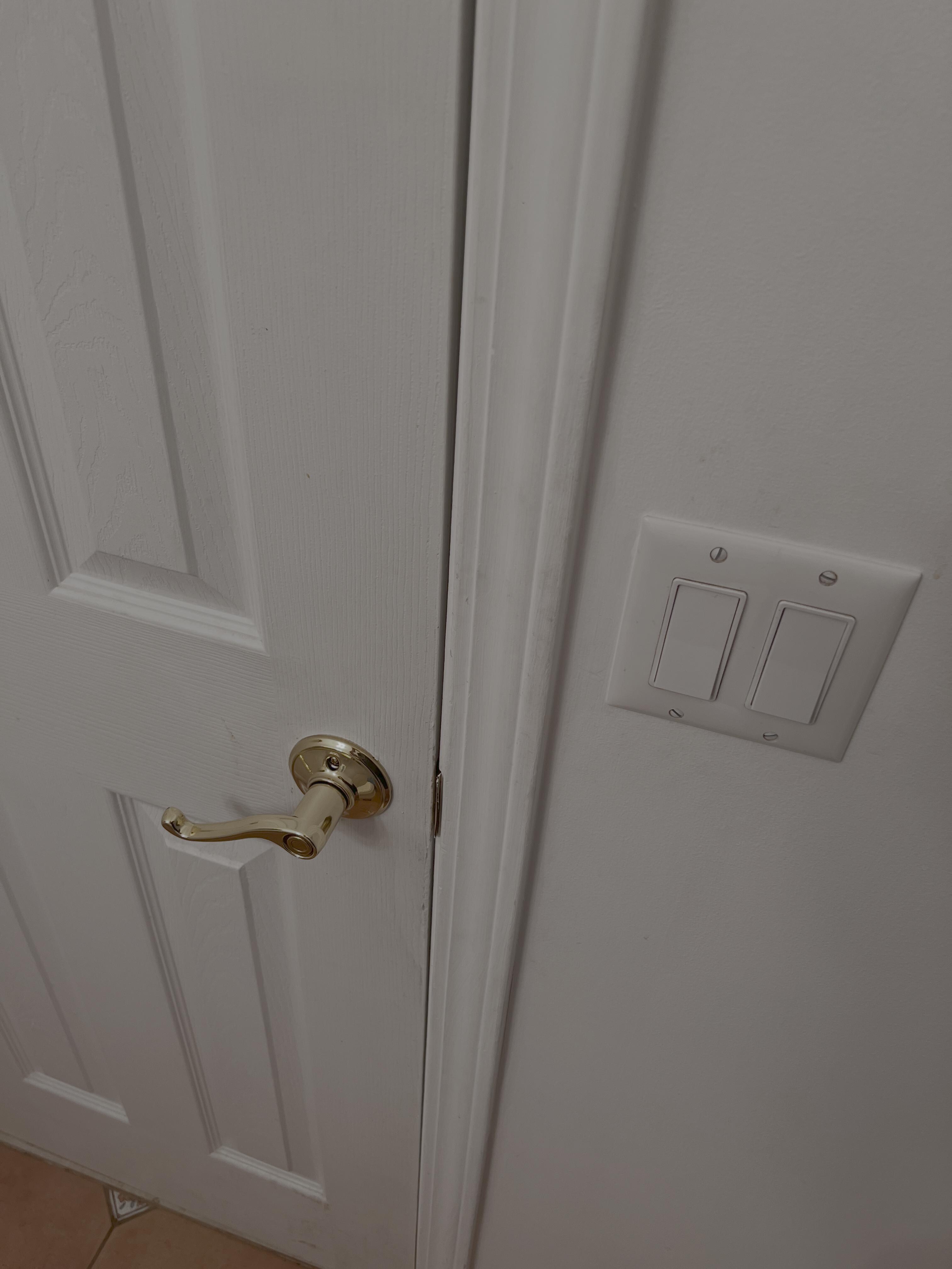 General dirt/shoe prints/hand prints on walls and door frames.