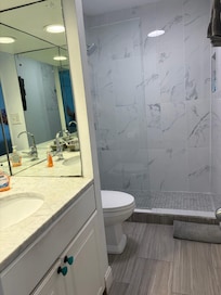 Bathroom with comfort height toilet.