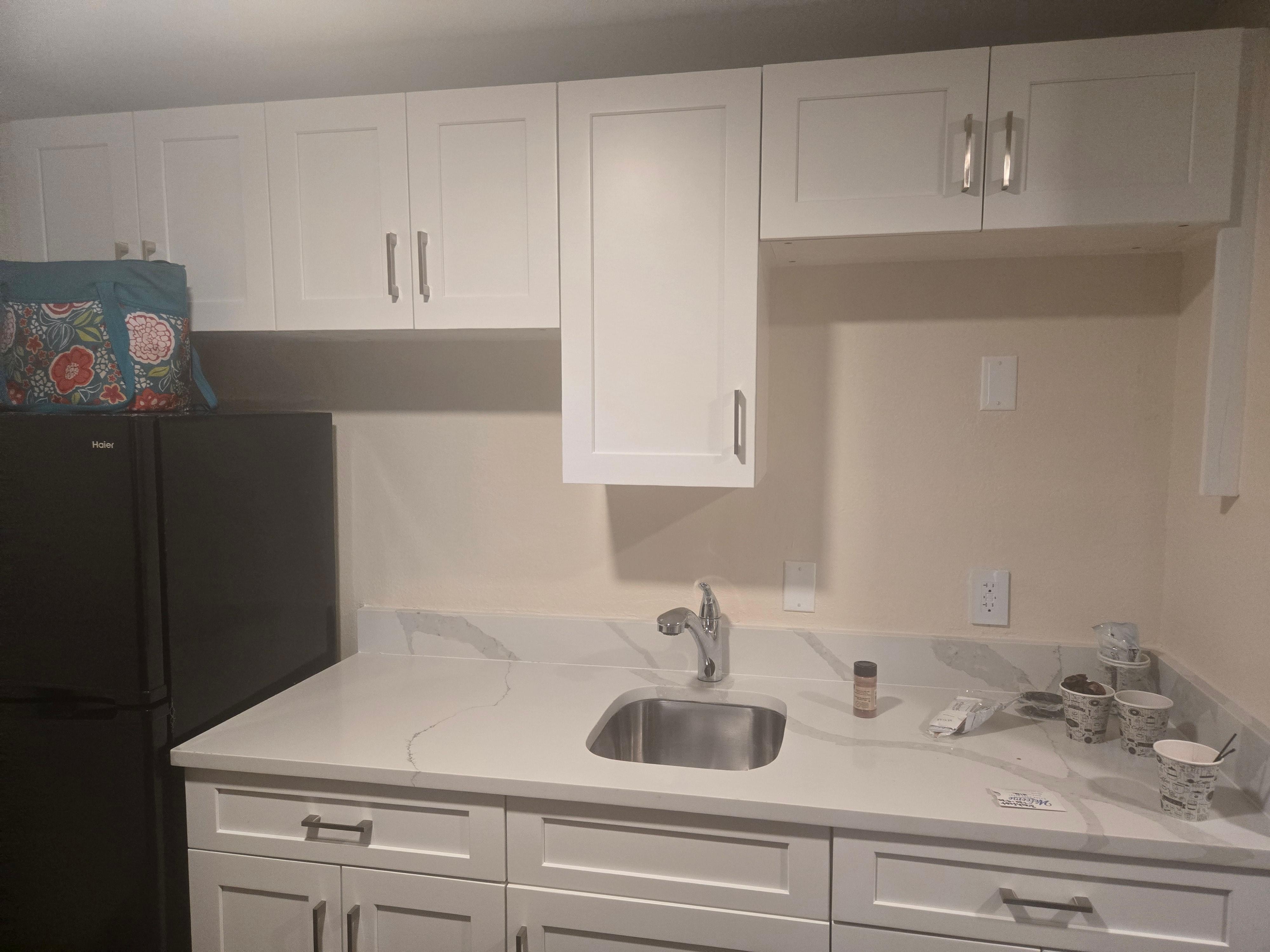 No microwave or coffee pot and all cabinets are empty 