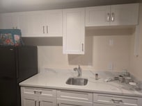 No microwave or coffee pot and all cabinets are empty