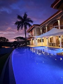 Pool and hotel at night