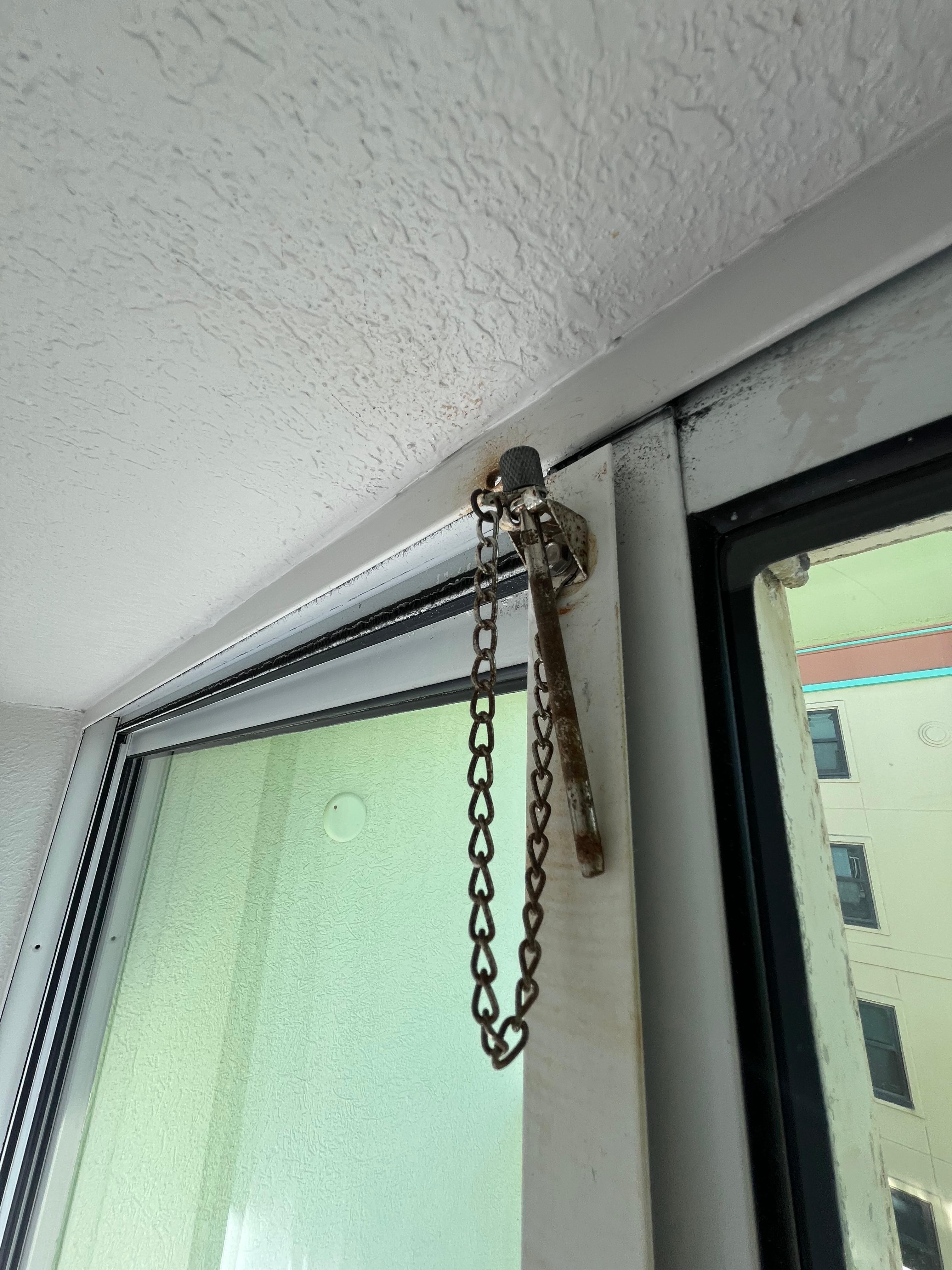 Rusty sliding door hardware & difficult to open/close even for my husband 