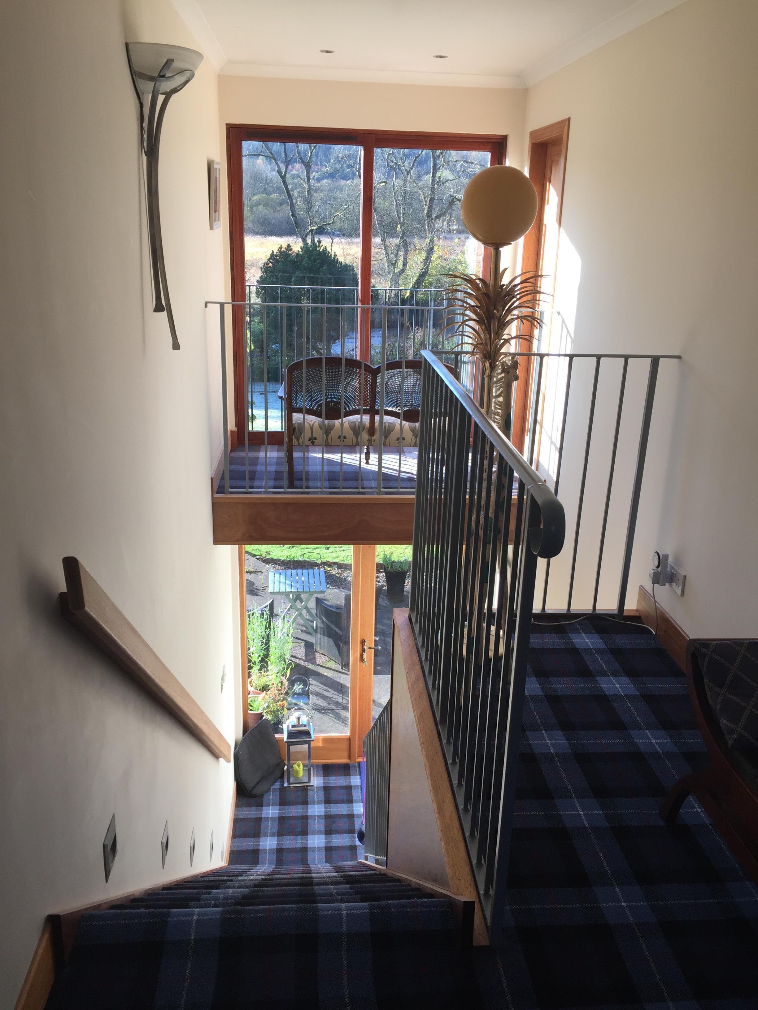 Sitting area from our bedroom and stairs to garden