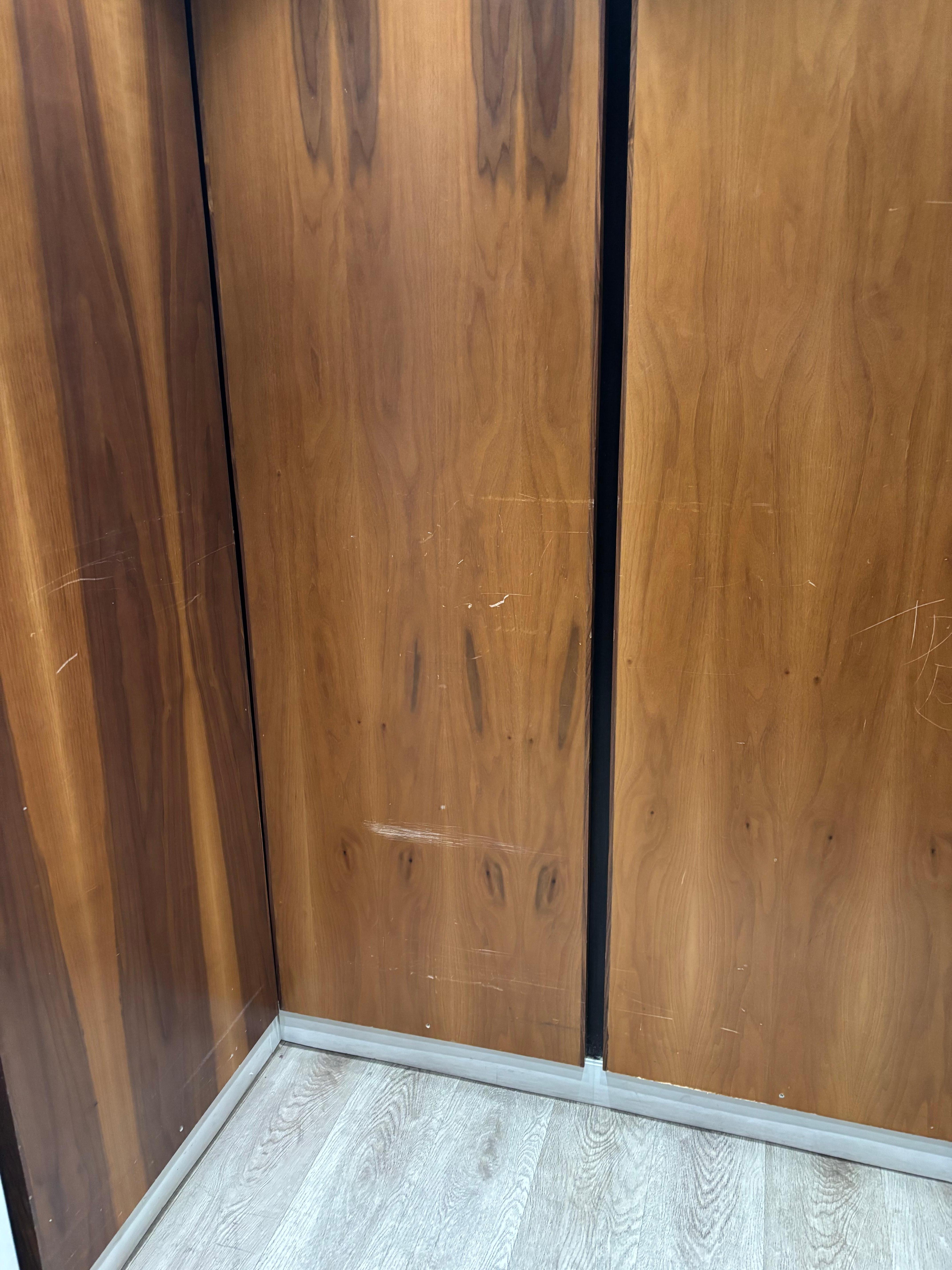 Initials were all over the elevator.