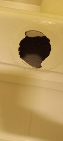 Hole on side of tub. How does this even happen?
