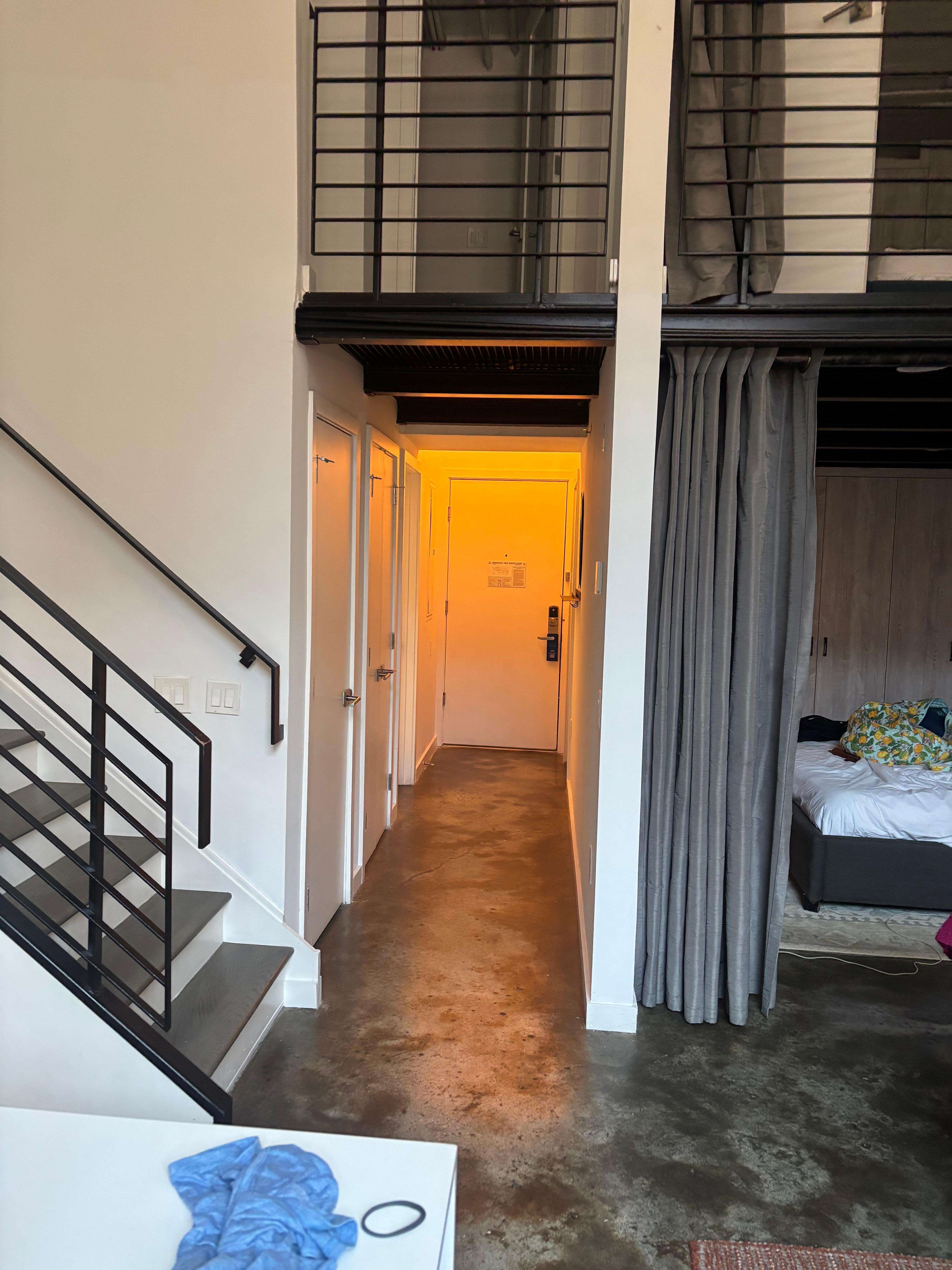 Taken from living room, looking out toward the hallway and the door into the apartment